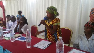 Woman speaks during event in Cameroon